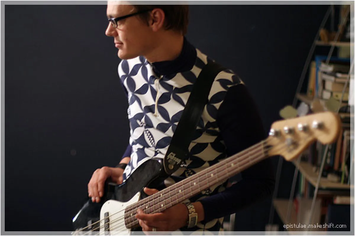 Quentin playing bass guitar